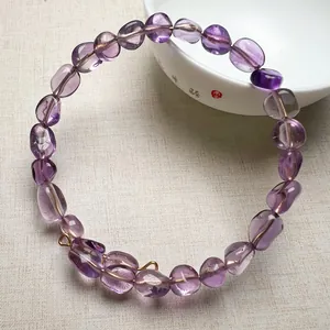 Bracelet en perles d'améthyste naturelle avec cristaux polis et fermoir doré