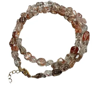 Natural rutilated quartz beaded necklace with irregular stones and golden lobster clasp