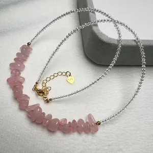 Beaded necklace with strawberry quartz crystals and S925 sterling silver heart charm