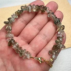 Pulsera de fragmentos de cuarzo rutilado natural con cierre de langosta dorado y cadena
