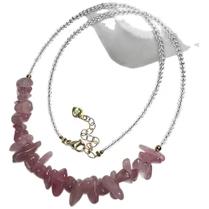 Pink strawberry quartz beaded necklace with gold lobster clasp and heart pendant