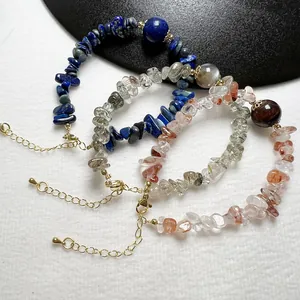 Natural crystal chip bracelets featuring lapis lazuli and strawberry quartz with gold clasp
