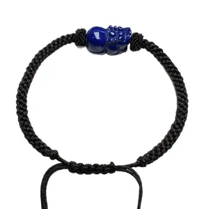 Natural lapis lazuli Pi Xiu charm bracelet with handcrafted black woven cord knot