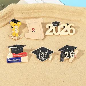 Set of 6 enamel graduation pins featuring 2026 teddy bear and diploma designs