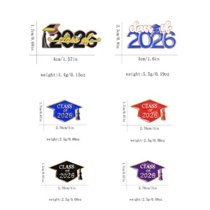 Detailed view of Class of 2026 enamel pins and graduation cap badges in various colors