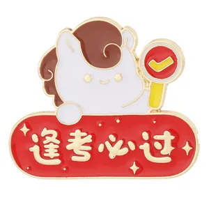 Macro detail of enamel lucky horse brooch with gold trim and success message