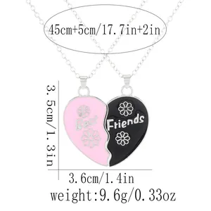 Detail showing dimension specs of BFF heart pendant necklaces with daisy patterns