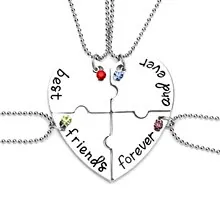 Detail of 4-piece puzzle heart necklace set with colorful rhinestones for best friends