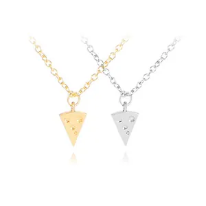 Detailed close-up of cheese triangle pendant necklaces in gold and silver finish