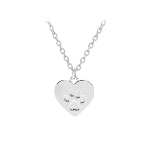 Minimalist silver heart pendant necklace featuring a pet dog paw print on O-chain