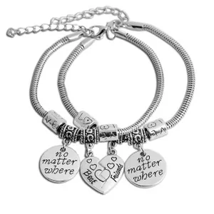 Detail view of Best Friends heart pendants on silver snake chains with LOVE beads