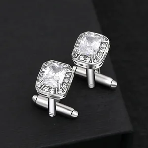 Macro di gemelli in argento con pietra centrale rettangolare e piccoli cristalli