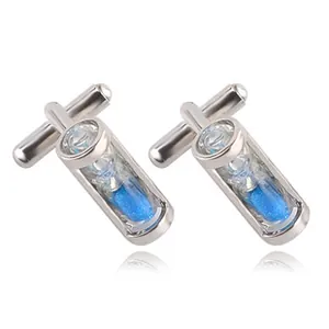 Detailed view of silver metal cufflinks featuring unique blue hourglass sand timers