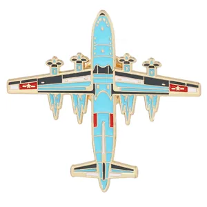 Detailed close-up of a blue enamel vintage four-engine propeller plane brooch pin