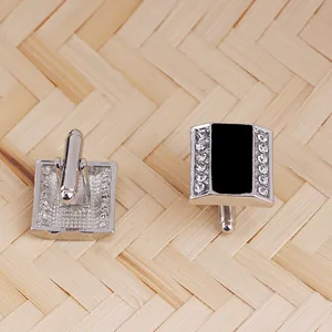 Silver square cufflinks with black enamel inlay and sparkling white rhinestones