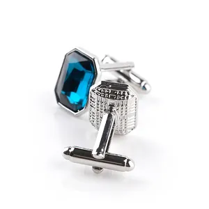 Elegant men's silver cufflinks with rectangular deep blue crystal in a polished finish