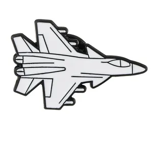 White enamel aircraft lapel pin in fighter jet shape with durable metal base for bags