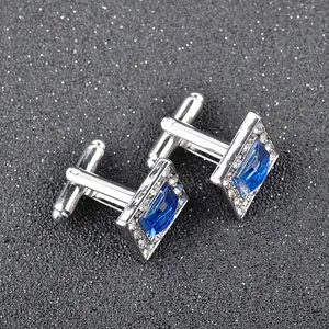 Boutons de manchette argentés pour hommes avec pierre bleue et serti de zircons