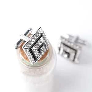 Elegant square silver cufflinks with sparkling crystals and black enamel geometric design