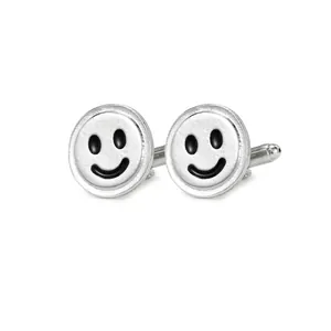 Zilveren ronde manchetknopen met zwart smiley-patroon en geborstelde metalen afwerking