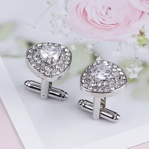 Elegant silver heart-shaped cufflinks with sparkling crystals for formal shirts