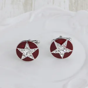 Silver round cufflinks with red enamel star and rhinestones on decorative plate