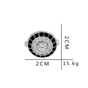 Silver round cufflinks for men with center crystal, small diamonds and black enamel inlay