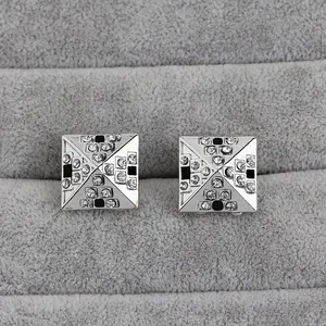 Vierkante zilveren manchetknopen met kristallen en zwart emaille geometrisch ontwerp