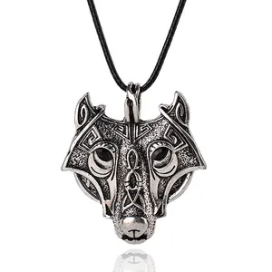 Vintage wolf head pendant necklace with antique silver finish and black woven leather cord