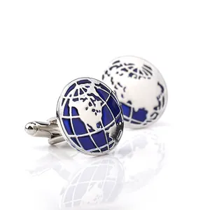 Detailed close-up of silver-plated earth cufflinks with blue enamel world map and T-bar back