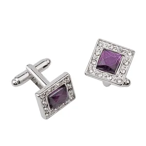 Detailed view of silver square cufflinks with purple crystal and sparkling rhinestones