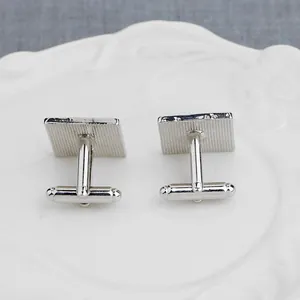 Classic silver square cufflinks for men shirts featuring a textured matte finish