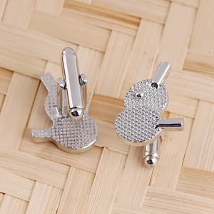 Polished silver ping pong paddle cufflinks for men with realistic racket texture
