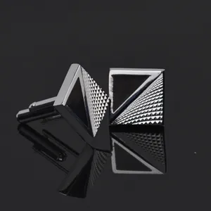 Elegant men's square silver cufflinks with black enamel and textured geometric pattern