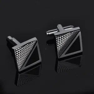 Square silver and black enamel cufflinks with geometric pyramid texture for men