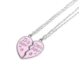 Pink heart-shaped split pendant necklace set for sisters with Big and Little Sister engraving