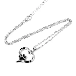 Polished silver heart pendant necklace with black enamel paw print and O-chain
