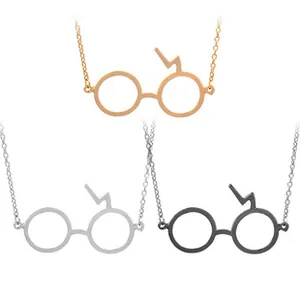 Detailed trio of Harry Potter glasses and lightning bolt pendants in rose gold, silver, and black