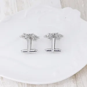 Detailed back view of silver snowflake cufflinks showing a classic T-shaped rotating clasp