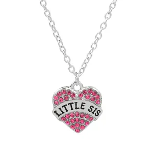 Silver heart necklace with pink crystals and LITTLE SIS engraving for sisters