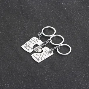 Three-piece stainless steel puzzle keychain set with father mother daughter engraving