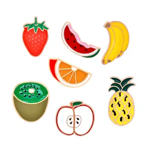 Set of seven colorful enamel fruit brooches featuring strawberry banana and pineapple
