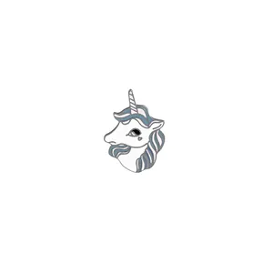 Detail view of unicorn enamel pin with pastel mane and heart eye detail on white background