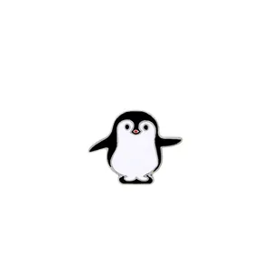 Cartoon penguin enamel pin badge in classic black and white metal finish for couples
