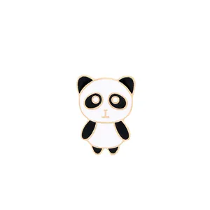 Cute enamel panda brooch with black and white cartoon design and gold metallic finish