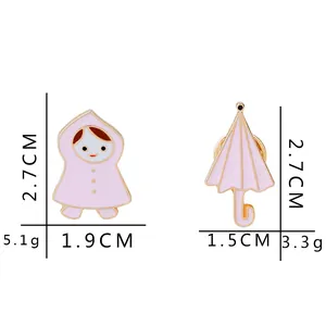 Set de broches émaillées avec fille en imperméable rose et parapluie avec dimensions