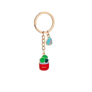 Detail of zinc alloy cactus keychain with colorful drip oil enamel plant charms