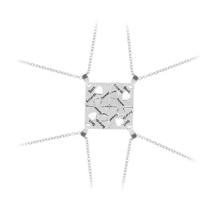 Silver puzzle piece necklaces for four friends with heart cut-outs and BFF engraving