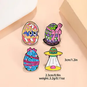 Detailed close-up of colorful Easter egg and UFO enamel pins with creative slogans