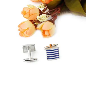 Silver cufflinks with blue stripes and swivel toggle closure for formal men's shirts